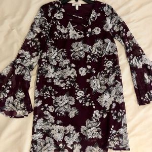 Flowy purple dress with bell sleeves